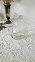 Small, slanted thick glass jar with lid, storage