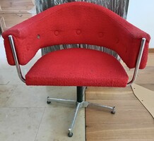Zephyr horseshoe-backed retro armchair with a working stable structure