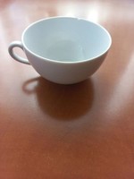 White porcelain tea cup - damaged
