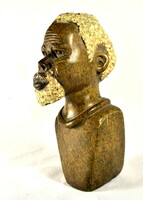 Busman man ... Carved art deco stone statue