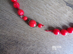 A wonderful fiery red porcelain necklace