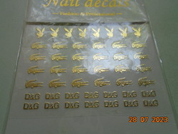 D&g gold-colored nail decoration, nail sticker in unopened packaging with instructions for use