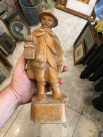 XX. Wooden statue from the beginning of the century, depicting a rural man, 18 cm high.