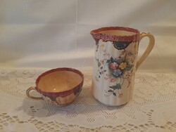 Beautiful earthenware jug with cup