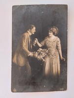 Romantic couple with old postcard photo postcard
