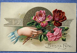 Antique embossed greeting card hand holding rose
