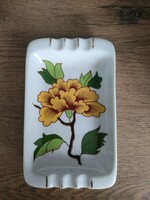 A porcelain ashtray with floral pattern from Höllóháza