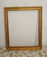 Antique gilded wooden picture frame, external size 39 x 23.5 Cm.