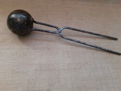 Old snowball baking spoon with wrought iron handle