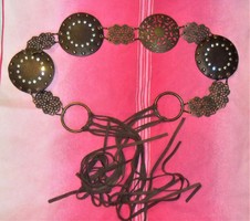 Special brass-plated leather strap with rivets and rhinestones, even for filming!