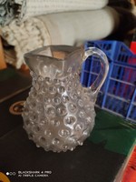 Handcrafted jug with a cam