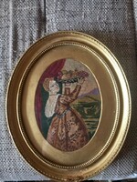 In a larger tapestry frame