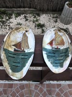 Kagyló ra festett vitorlás hajó .