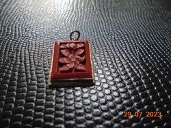 Antique Chinese carved flower cinnabar pendant in sterling silver setting