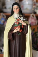 Saint Thérèse of Lisieux is a large, beautiful statue, figure, with beautiful painting