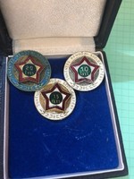Volunteer police badges for 15, 20, 25 years of service.