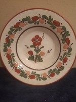 Old ceramic painted wall plate