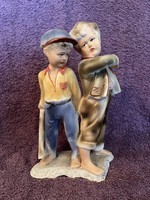 Quarrelsome boys matte porcelain figure