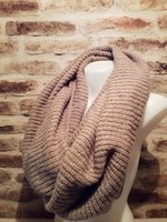 A huge knitted circle scarf