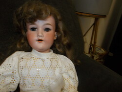 Doll with antique porcelain head