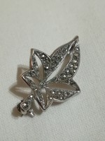 Silver brooch.