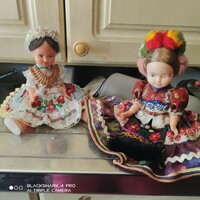 2 old dolls in folk costume