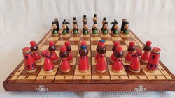 Painted, carved wooden chess set