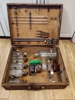 Old mobile laboratory in a wooden suitcase