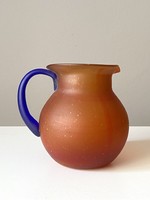 Czech retro glass jug with orange body and blue handle