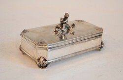 Silver box - with a figure of a child riding a mythical creature