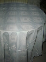 Beautiful light blue checkered damask tablecloth with a lace edge