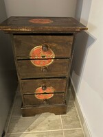 Wooden chest of drawers with a Chinese motif