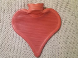 Retro, heart-shaped bed warmer or hot water bottle