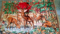 Old silk carpet/wall protector with a deer scene