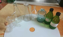 Old retro pharmacy laboratory flask and medicine bottles in one