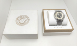 228T. Versace v-circle manifesto steel men's watch, unworn, with original box and papers