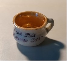Mini potty with inscription, inside with luster glaze