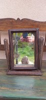 Folk tramp art, wolf tooth carving mirror