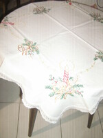 Beautiful Christmas hand-embroidered linen tablecloth with a lace edge