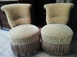 A pair of old French armchairs