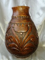 The tulip ceramic vase is damaged