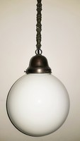 Old ceiling lamp with milk glass sphere shade