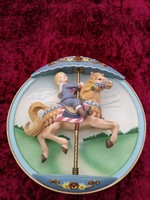 A rare, special bradex musical plate with a moving child on a horse