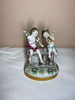 Antique continental porcelain musical putts 13cm