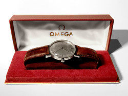 Very nice silver dial omega 35 mm diameter but looks like 37-38! Factory box! Accurate!