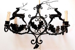 Hunter wrought iron figural ceiling chandelier. Negotiable