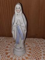 Old porcelain Virgin Mary statue