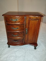 A beautiful old jewelery cabinet on lion's claw legs