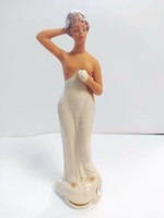 Antique porcelain woman statue