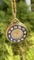Trelawn gold-colored zodiac small pocket watch on a chain